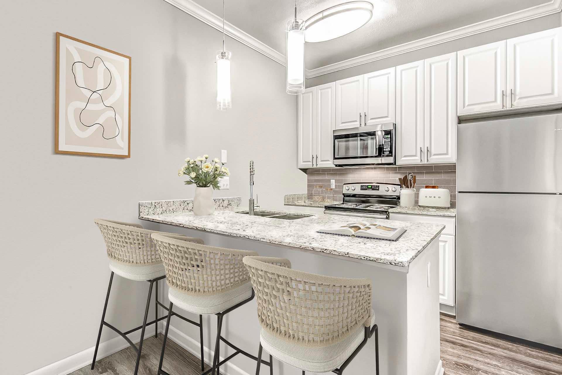 kitchen with modern lighting, breakfast bar, white cabinets and wood-style flooring